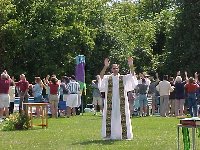 Mass in the Grass